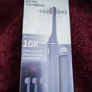Electric Toothbrush with Extra Heads